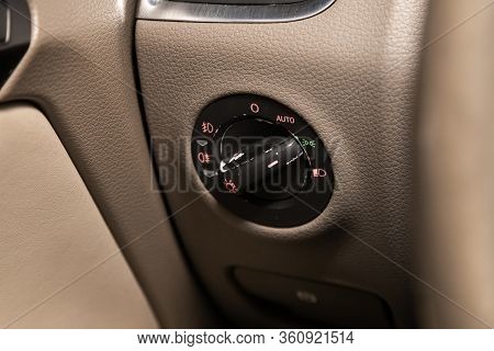 Novosibirsk/ Russia - April 02, 2020: Audi Q7, Close-up Of The  Headlight Setting Buttons. Modern Ca