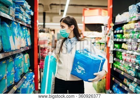 Shopper With Mask Safely Buying For Groceries Due To Coronavirus Pandemic In Grocery Store.covid-19 