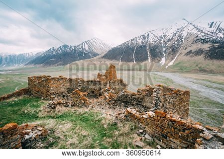 Ancient Stone Fortress On Mountain Background Near Karatkau Village, Kazbegi District, Mtskheta-mtia