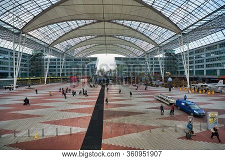 MUNICH, GERMANY - CIRCA JANUARY, 2020: view of the Munich Airport Center in the daytime. The Munich Airport Center is a shopping, business, and recreation area that connects the terminals