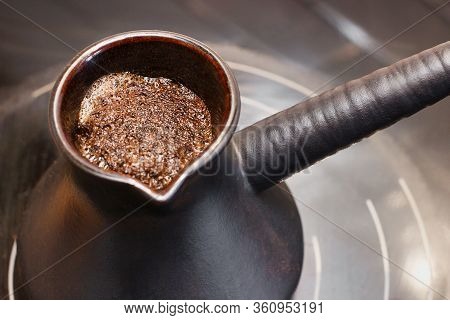 Karamic Turk With Coffee On An Electric Stove