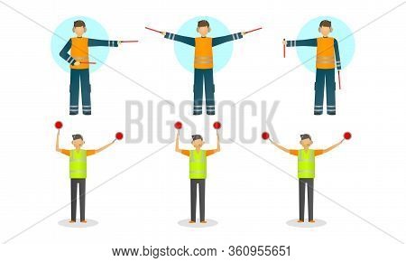 Set Of Young Traffic Controller In Special Costume With Equipment During Work