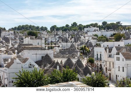 Alberobello, Italy - September 16, 2019: Tradtional White Houses In Trulli Village. Alberobello, Ita