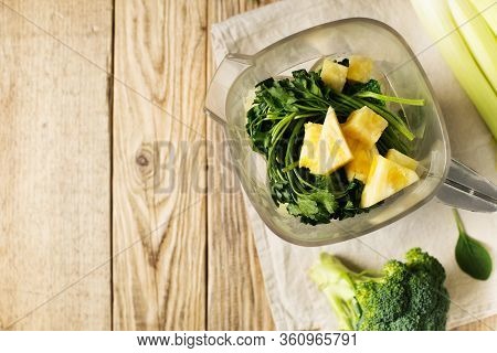 Ingrediets For Green Smoothie - Parsley, Spinach, Broccoli And Celery On Wooden Table, Top View, Cop