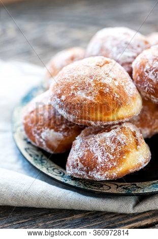 Homemade Donuts With Sugar Topping On A Plate