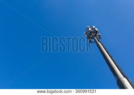 Telecommunication Tower With Microwave Equipment, Radio Panel Antennas, Outdoor Remote Radio Units, 