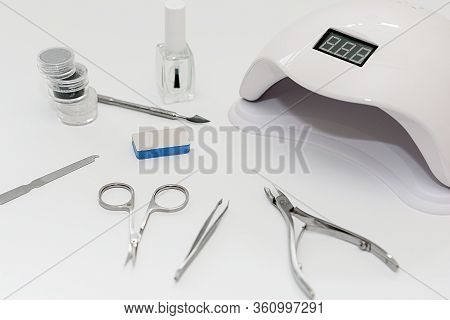 Manicure Kit Gel Nail Polish On White Background