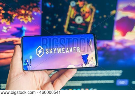 Russia Moscow 25.12.2021 Logo Of Skyweaver. Blockchain Nft Ethereum Cryptocurrency Strategy Game. Ma