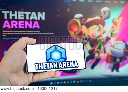 Russia Moscow 25.12.2021 Logo Of Thetan Arena. Blockchain Nft Ethereum Cryptocurrency Strategy Game.