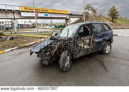 Hostomel, Kyev Region Ukraine - 09.04.2022: Shot Cars. On The Streets Of Irpin. Cities Of Ukraine Af