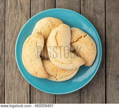 Chipas, Typical South American Cheese Bun Over Wooden Table.