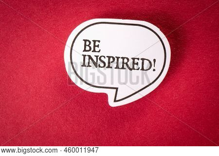 Be Inspired. Speech Bubble With Text On Red Background