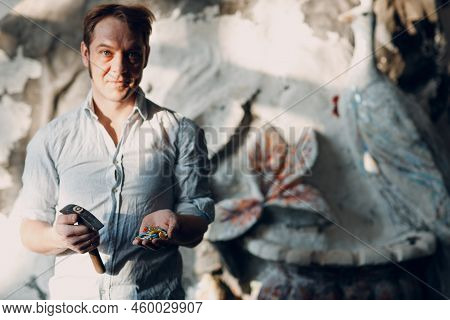 Craftsman Male Master Portrait Hold Hammer And Smalt Glass Pieces In Arm Hand For Mosaic Artwork In 