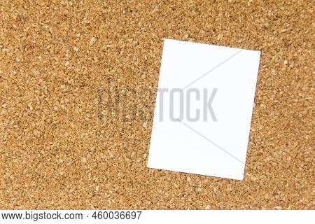 White Note Paper Place On Corkboard Background With Copy Space