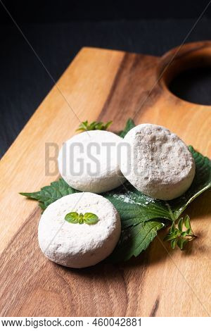 Food Concept French Organic Goat Cheese Picodon Form Southern France On Wooden Board With Copy Space