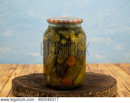Preservations, Conservation. Salted, Pickled Cucumbers In A Jar On An Wooden Table. Pickling Cucumbe