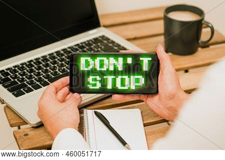 Hand Writing Sign Don T Not Stop. Concept Meaning Continue What Had Been Doing Without Rendering A D