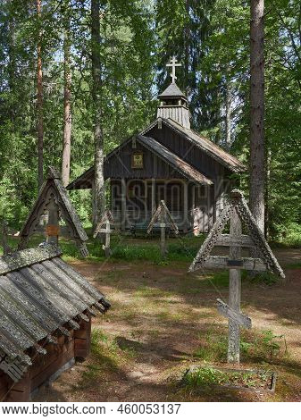 In Old Cemetery Of Uusi Valamo Orthodox Monastery In Finland: Chapel, Crosses, Orthodox Tradition.