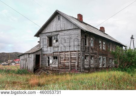Abandoned Wooden House At The Outskirts Of A Village