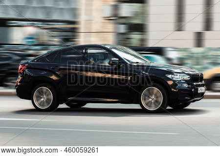 Black Color Car Bmw X6 F16 Xdrive 40d In Fast Motion On The Street. Moscow, Russia - August 2022