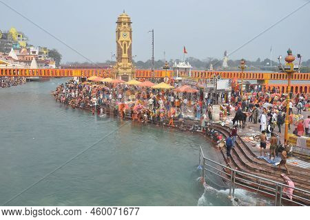 Haridwar, Uttarakhand, India - 02 25 2022: People Taking Bath In Holy River Ganga At Har Ki Pauri Gh