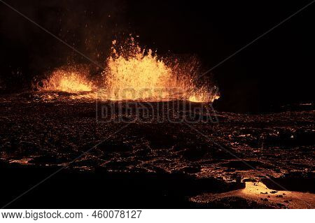 Volcano Eruption At Meradalir Near Fagradalsfjall, Iceland. Erupting Magma And Flowing Lava At Night