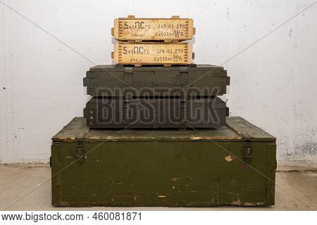 A Stack Of Boxes With Ammunition And Weapons. Concept: Storage And Transportation Of Weapons And Amm