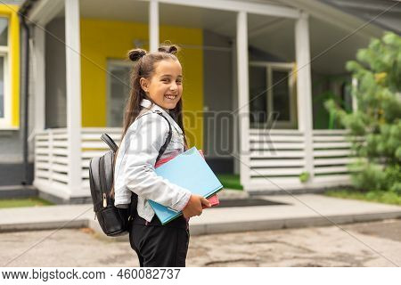 Nine Years Old Girl Student At School.