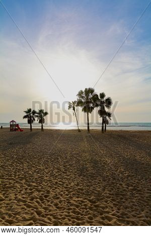 Sunset On The Beach Of Chipiona In Andalucia.