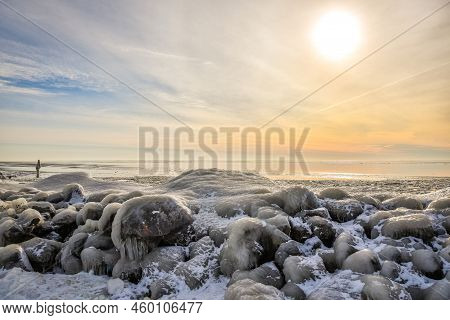 Oosterleek, The Netherlands - February 14, 2021. Ice Accretion And Floating Ice On Reeds Along The S
