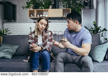 Asian Man Quarrels With His Wife, Accuses Him Of Squandering Family Money, Family Quarrel, Couple Si