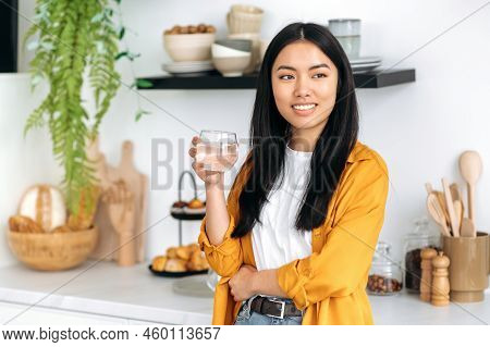 Healthy Lifestyle. Daily Water Intake. Positive Beautiful Chinese Girl In Casual Stylish Clothes, St