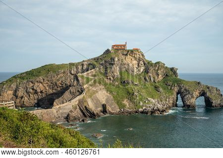 Stone Footpath To Famous Landmark And Film Location In North Of Spain, Ocean Islet With Chapel San J