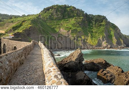 Stone Footpath To Famous Landmark And Film Location In North Of Spain, Ocean Islet With Chapel San J