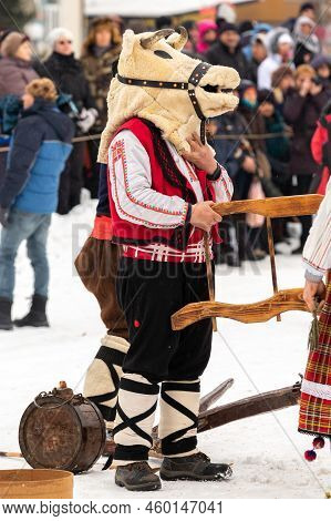 Razlog, Bulgaria - January 14, 2017: People In Traditional Carnival Kuker Costumes At Kukeri Festiva