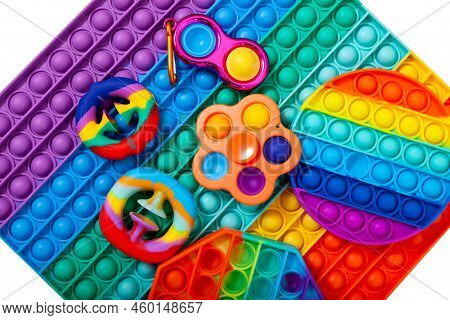 Trendy Pop It Fidget Toys. Different Colorful Rubber Toys For Children. Simple Dimple, Snapperz, Spi