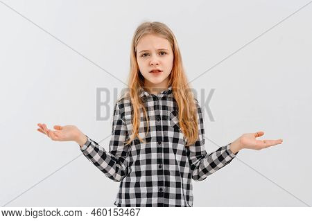 Clueless Teen Girl Shrugs Shoulders, Smiles Nervously, Saying Sorry, Dont Know, Have Nothing, Standi