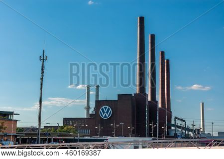 Wolfsburg, Germany - August 12, 2022: Chimneys Of The Volkswagen Car Factory Complex In Wolfsburg