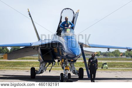 Farmingdale, New York, Usa - 26 May 2022: A Us Navy Pilot Is Standing Up In His Blue Angel Jet With 