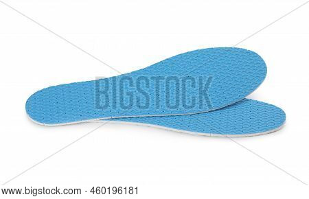 Pair Of Light Blue Insoles On White Background