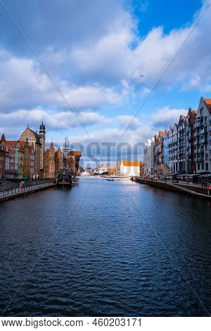 Ancient Crane - Zuraw Old Town In Gdansk. The Riverside On Granary Island Reflection In Moltawa Rive