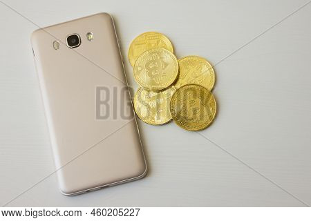 Bitcoin Currency And Mobile Phone Conceptual Image