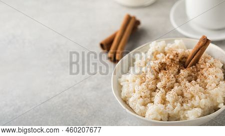 Scandinavian Rice Porridge In A Bowl With Cinnamon. Healthy Breakfast. Copy Space