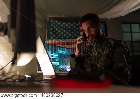 American Hacker In Military Unifrorm On Dark Web, Cyberwar Concept.