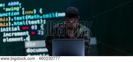 Hacker In Military Unifrorm On Dark Web, Cyberwar Concept.