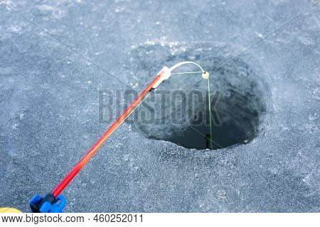 Round Ice. Winter Season, Ice Hole For Fishing