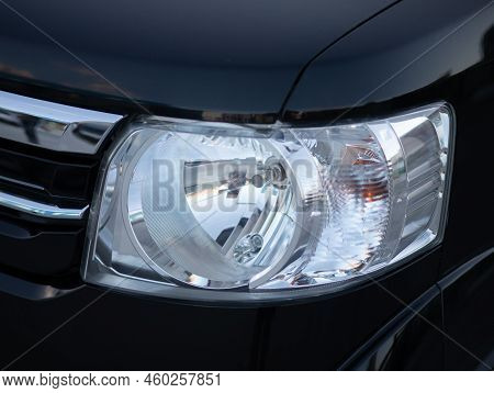 Novosibirsk, Russia -   August 03, 2022:   Honda N-box,   Close Up Of The Car Headlights. Exterior C