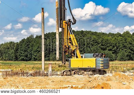 Powerful Hydraulic Drilling Rig At A Construction Site. The Device Of Pile Foundations. Bored Piles.
