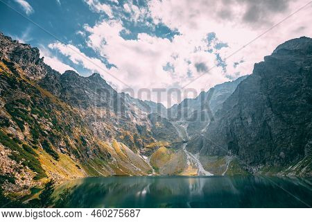 Tatra National Park, Poland. Calm Lake Czarny Staw Under Rysy And Summer Mountains Landscape. Beauti
