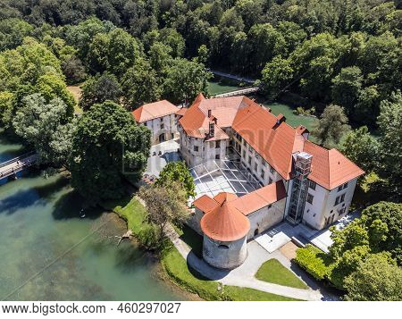 Romantic Otocec Castle On Krka River In Slovenia. Drone View.